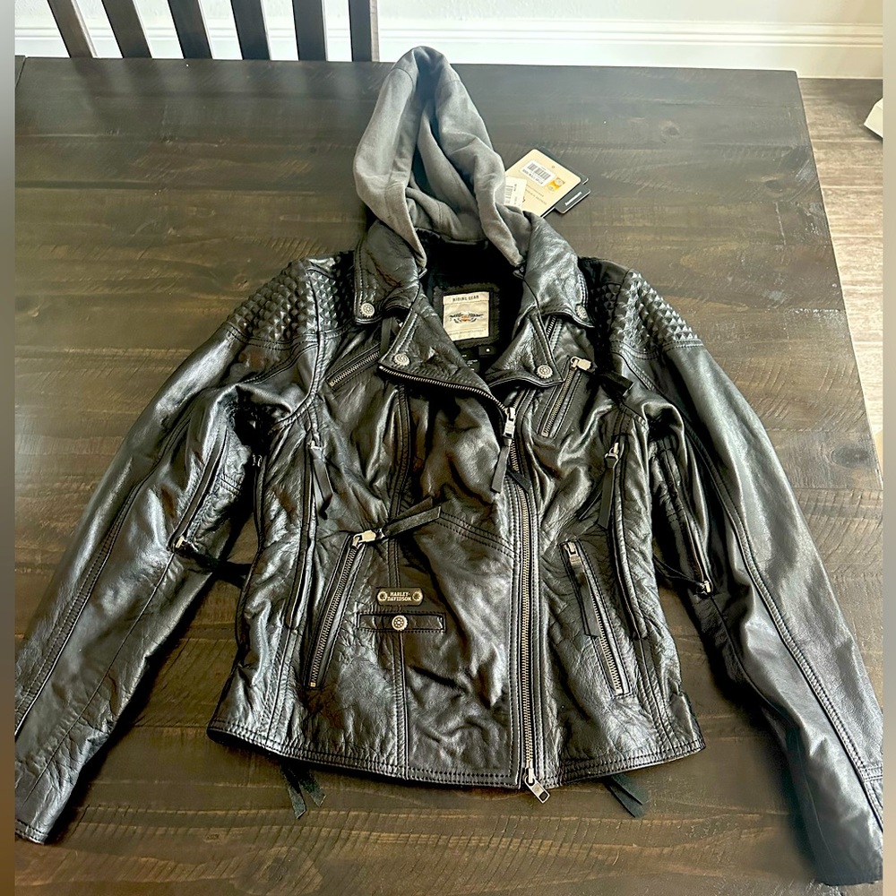 Brand new Harley Davidson leather, hooded riding jacket. Women’s size Small